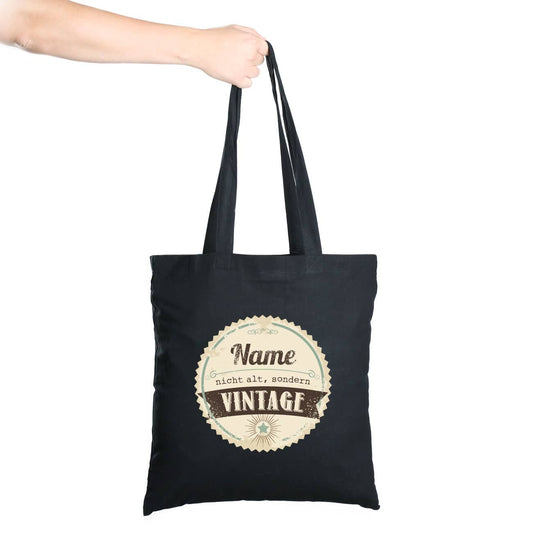Schwarzer Beutel mit Namensaufdruck - vintage
