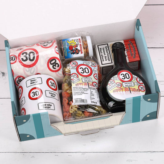 Witzige Produkte verpackt in einem Pappkoffer