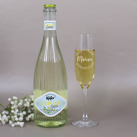 Lemon Secco von Käfer und Sektglas mit Namensgravur