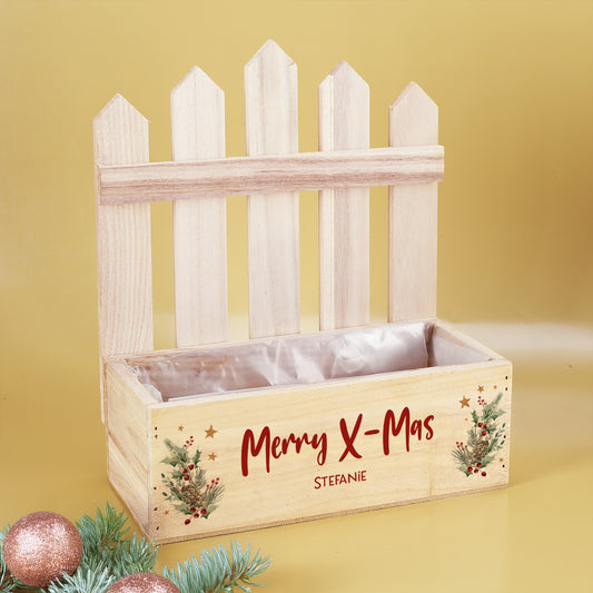 Personalisierbarer Pflanzkorb mit Zaun und roter Schrift Merry X-Mas als Weihnachtsdekoration
