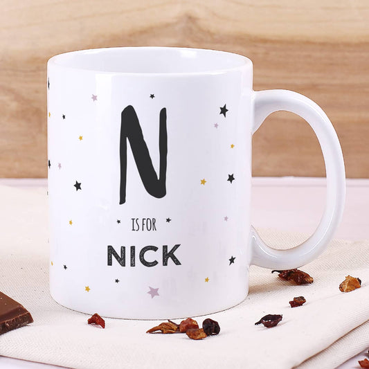 Tasse mit Sternen, Name und Initiale