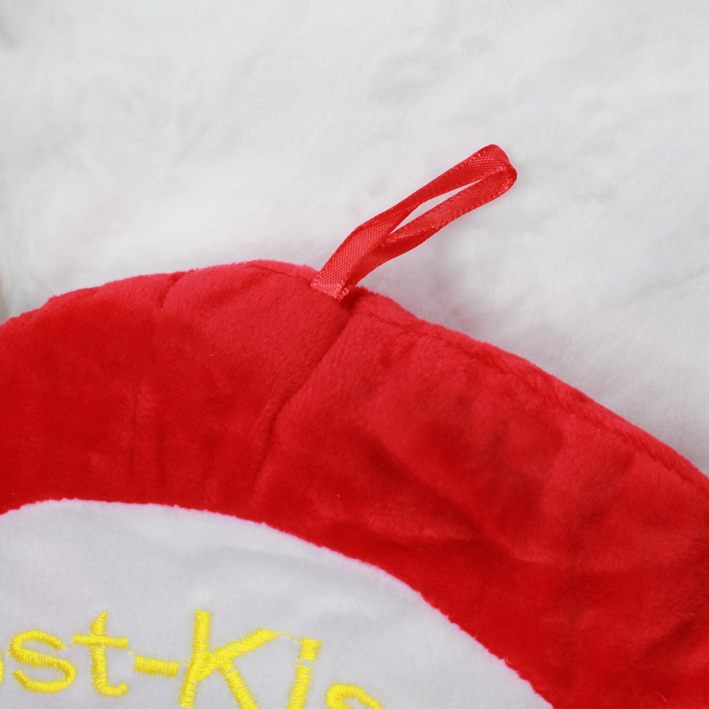 Nahaufnahme rote Aufhängeschlaufe Trostkissen 60