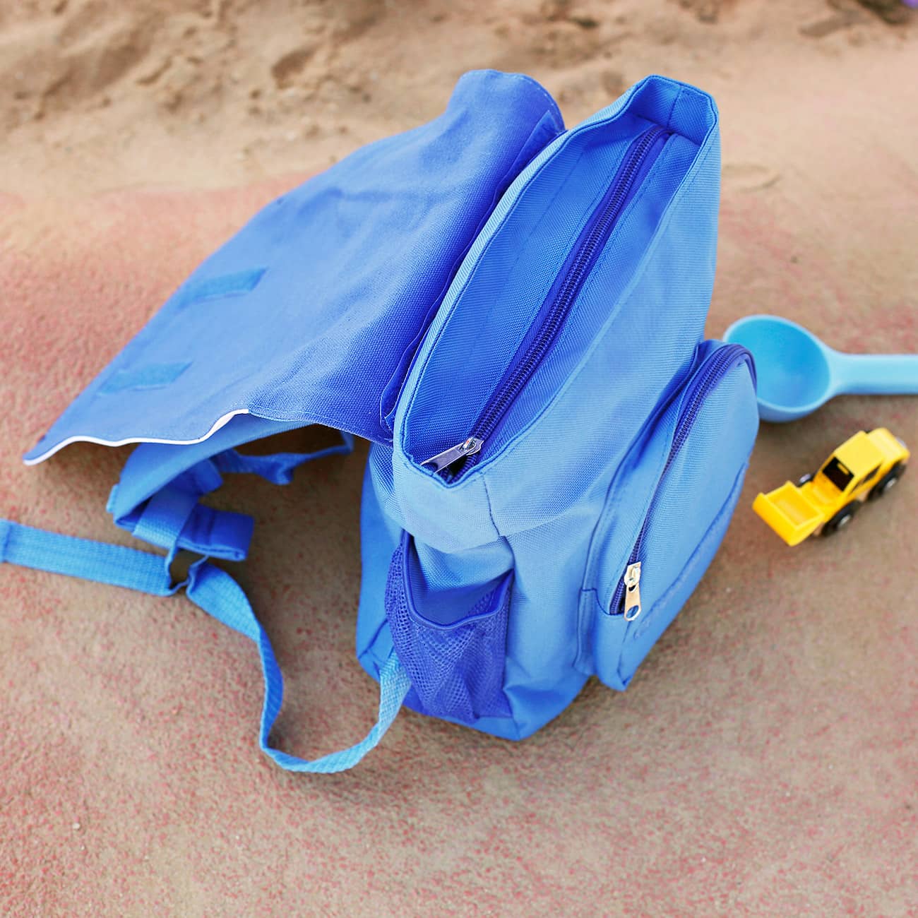 Blauer Kinderrucksack mit Polizeiauto und Name