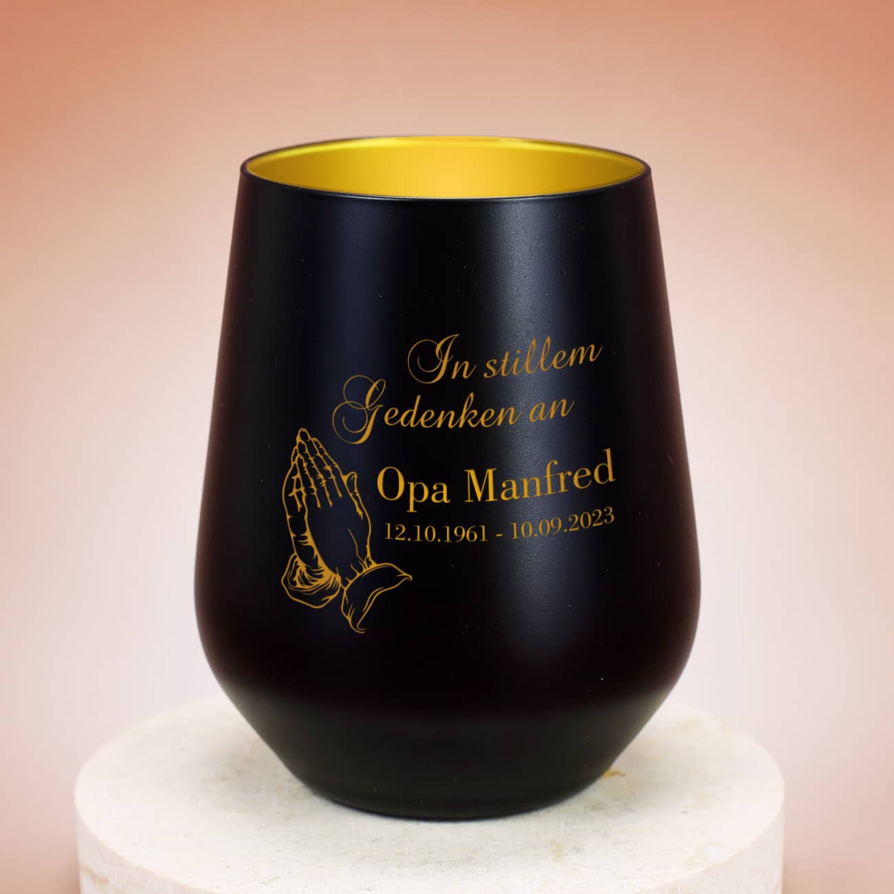 Schwarz-goldenes Gedenklicht als Trauergeschenk und Andenken an einen geliebten Menschen