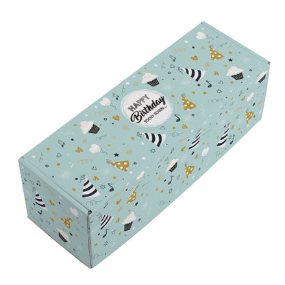 Dekorativ präsentierte Geburtstagsbox mit Inhalt (Beispiel) und farbenfrohem Motiv