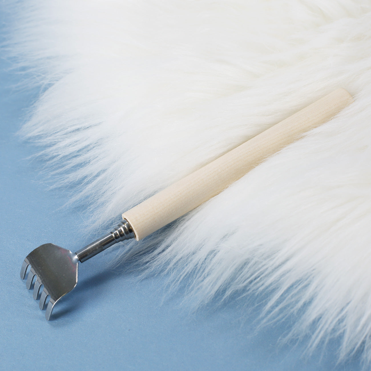 Rückenkratzer mit Auszug