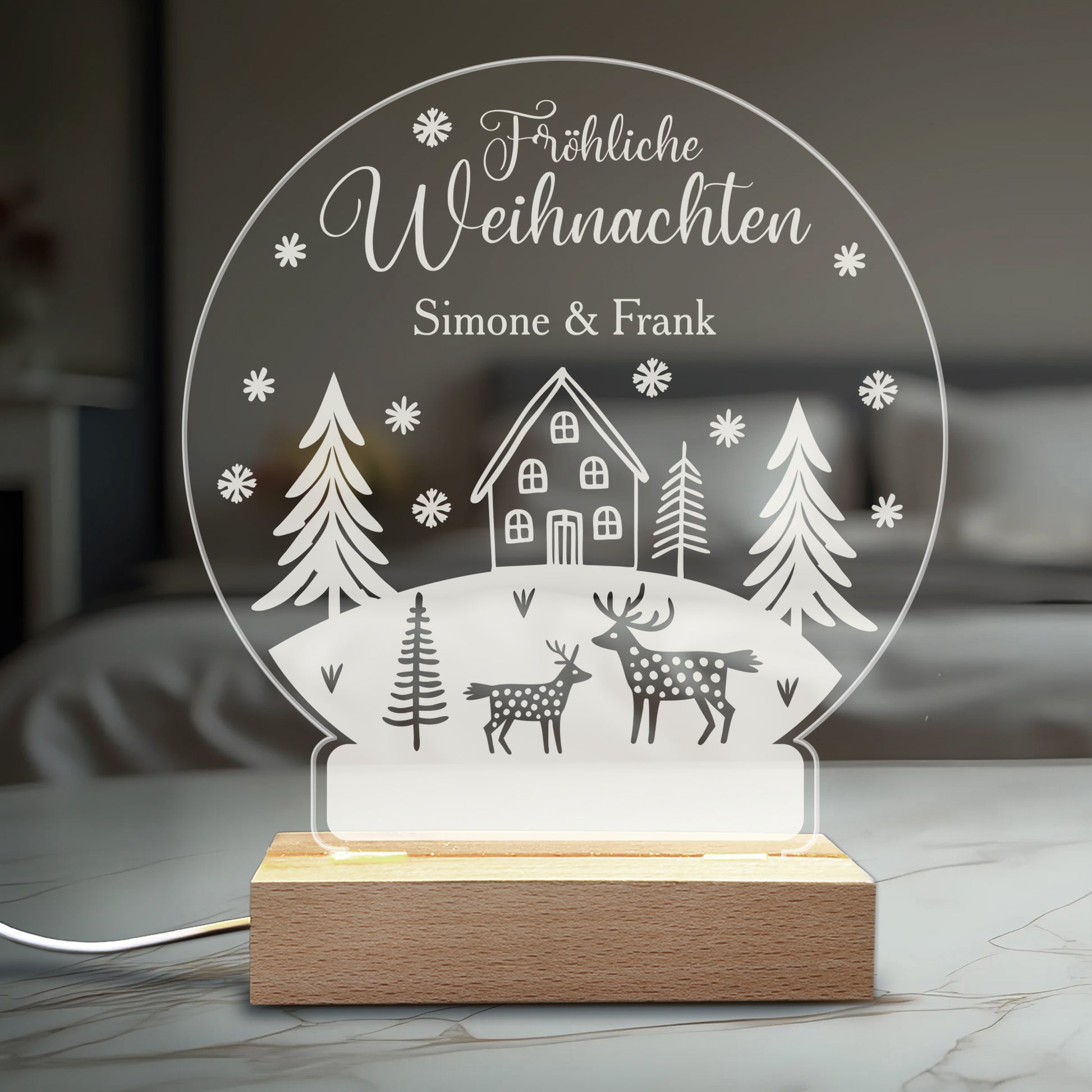 Weihnachtslicht mit personalisiertem Namen Simone & Frank, Holzsockel und LED-Beleuchtung