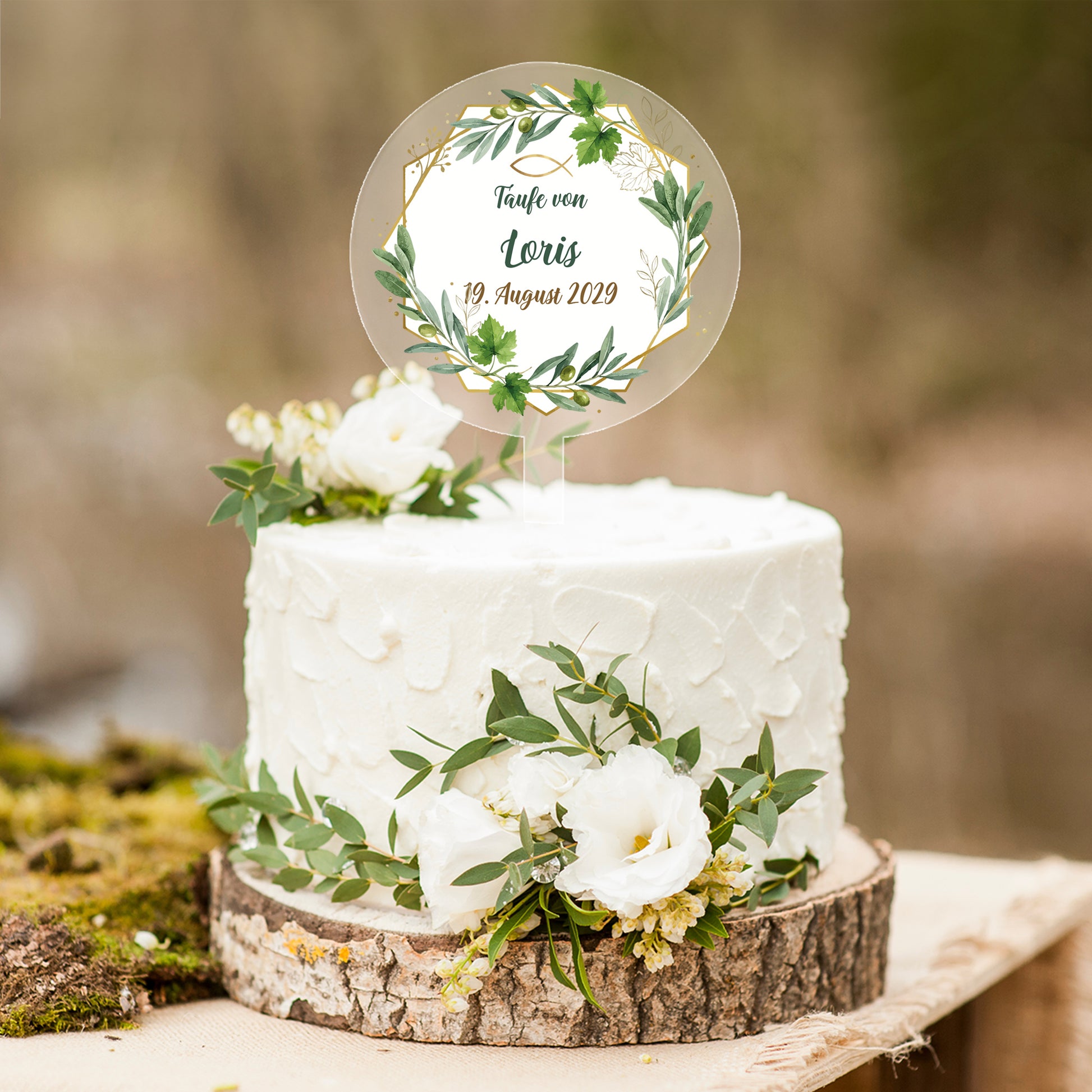 Personalisierter Tortentopper zur Taufe mit Eukalyptus-Motiv und Name Loris auf weißer Torte