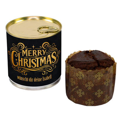 Freigestellter Weihnachts-Dosenkuchen „Merry Christmas“ mit personalisierter Textzeile neben ausgepacktem Schokoladen-Brownie
