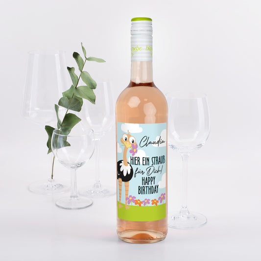 Geburtstagsweinflasche mit Straußen-Etikett, Name Theo, Roséwein, Blumen und Wolkenmotiv