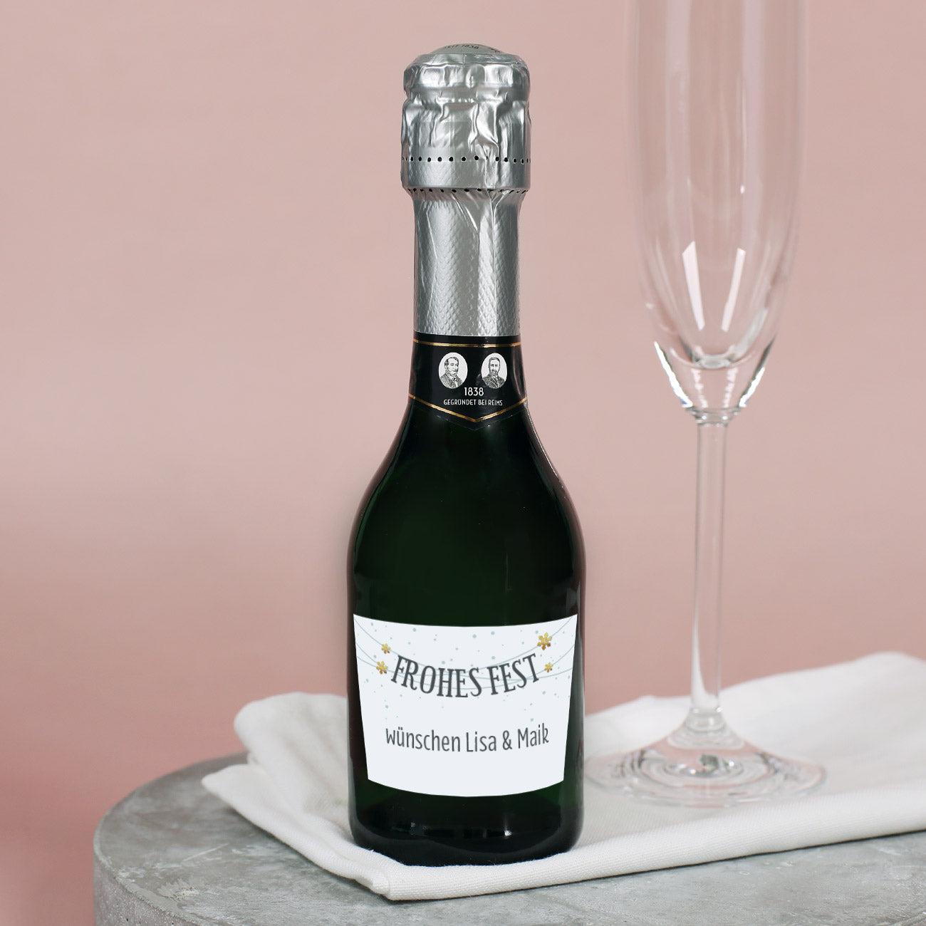 Kleine Sektflasche "Frohes Fest" mit persönlichem Etikett mit Wunschtext