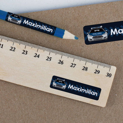 Aufkleber mit Streifenwagen und Name