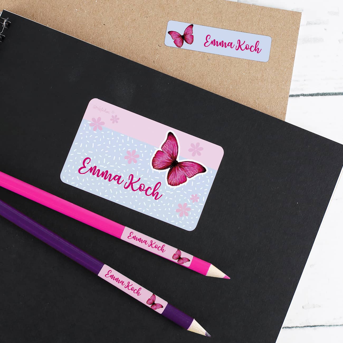 Schulaufkleber mit Schmetterling und Name (100 Stück)