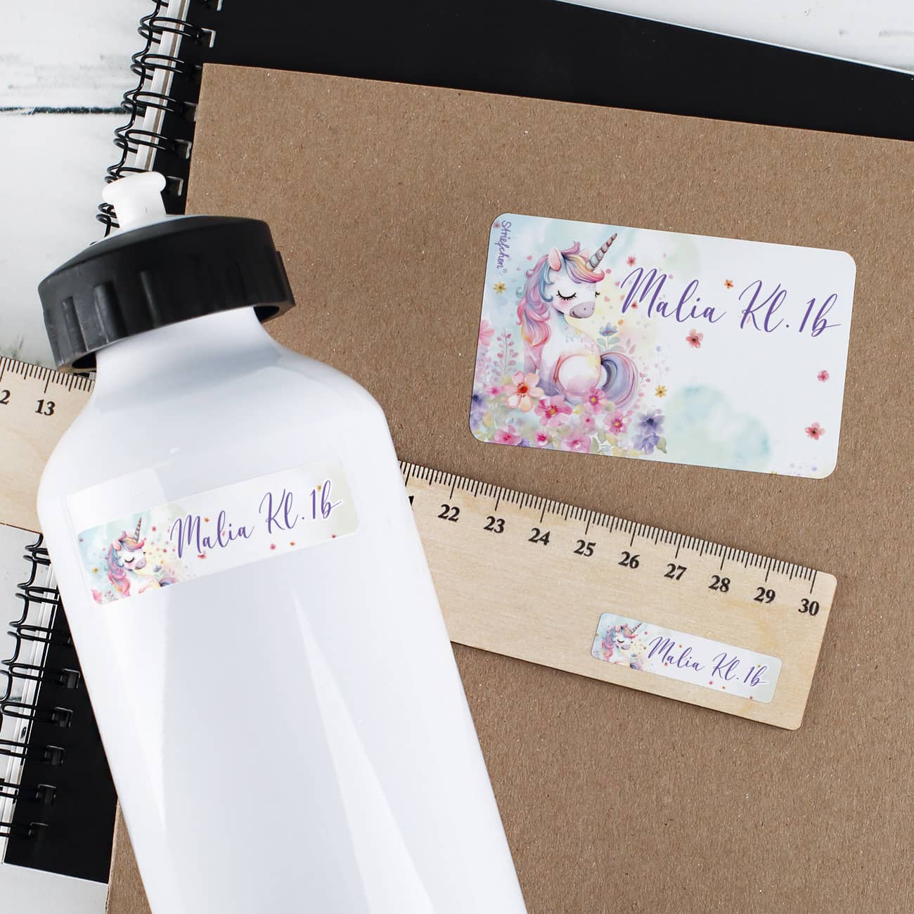 Schulaufkleber mit niedlichem Einhorn und Name