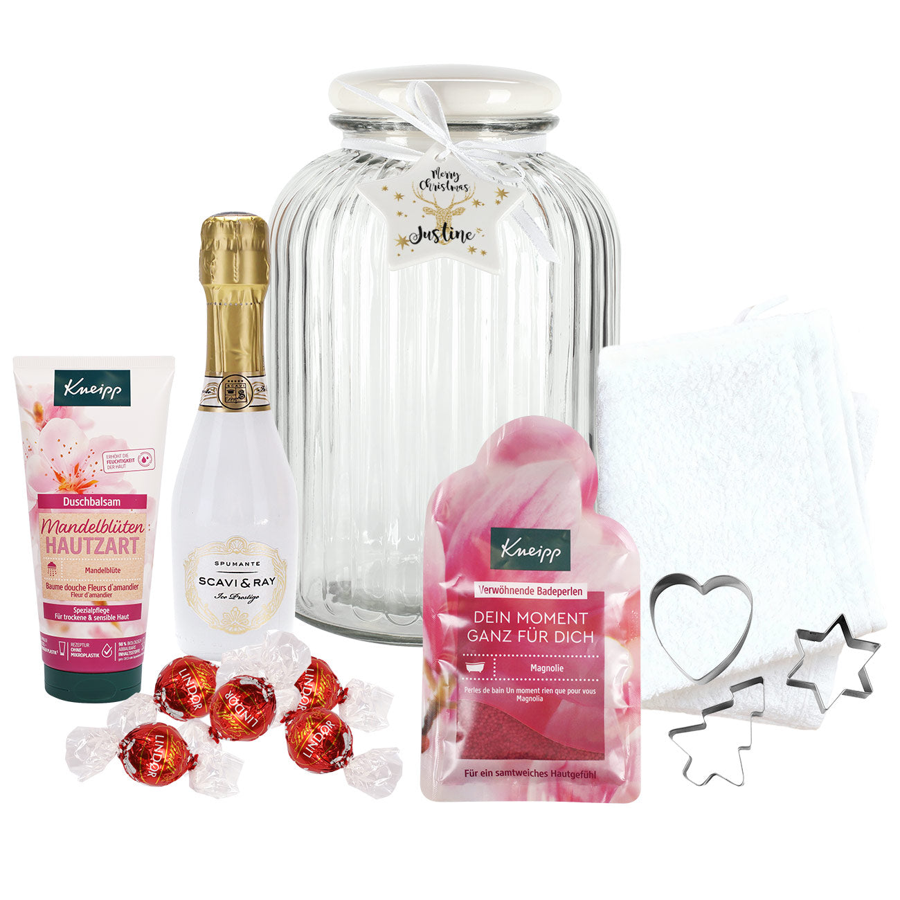 Pflegeset für Frauen im XXL Glas mit Piccolo und Schokolade zu Weihnachten freigestellt auf weißem Hintergrund