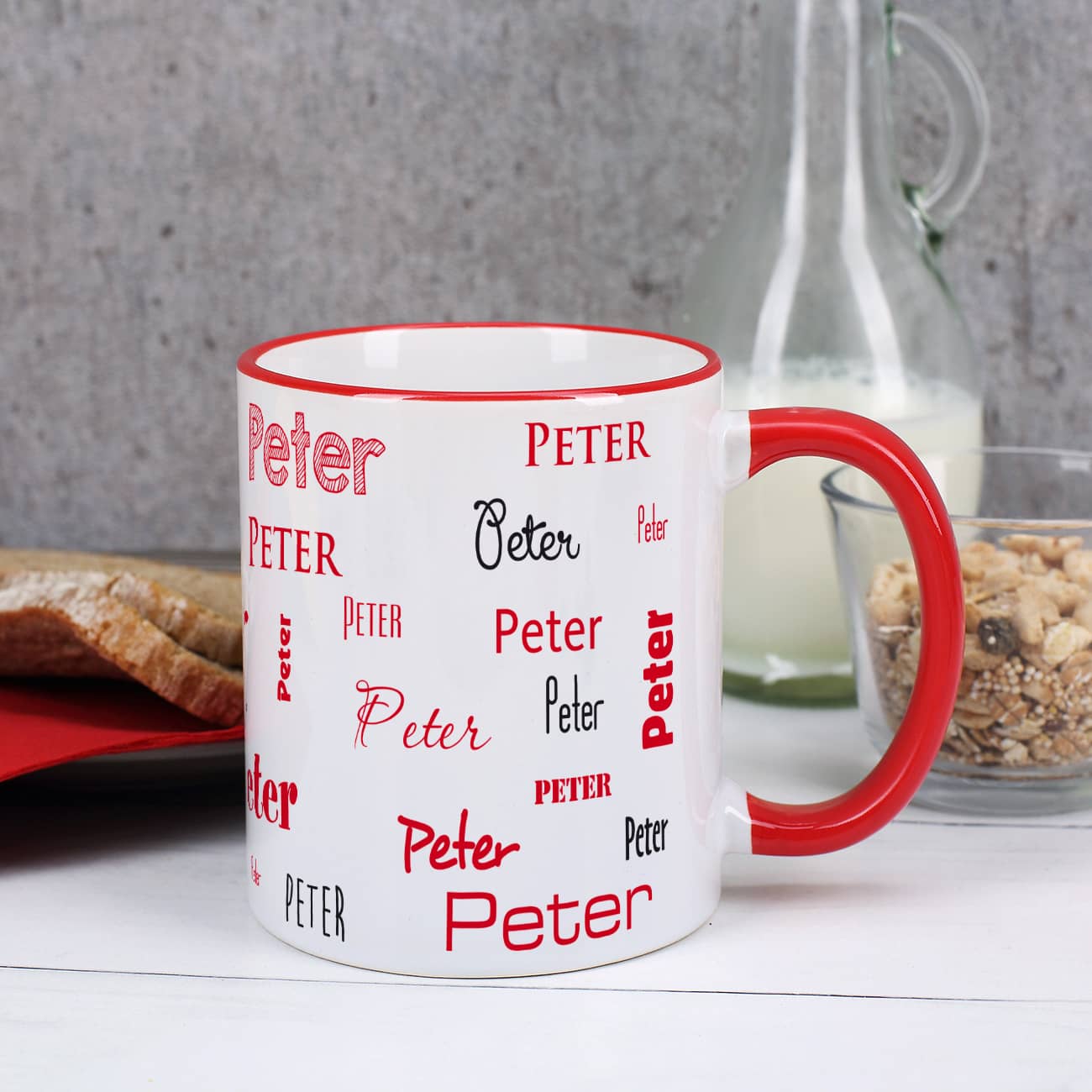 Namenstasse mit rotem Tassenrand & Henkel rundum mit Name nach Wunsch bedruckt