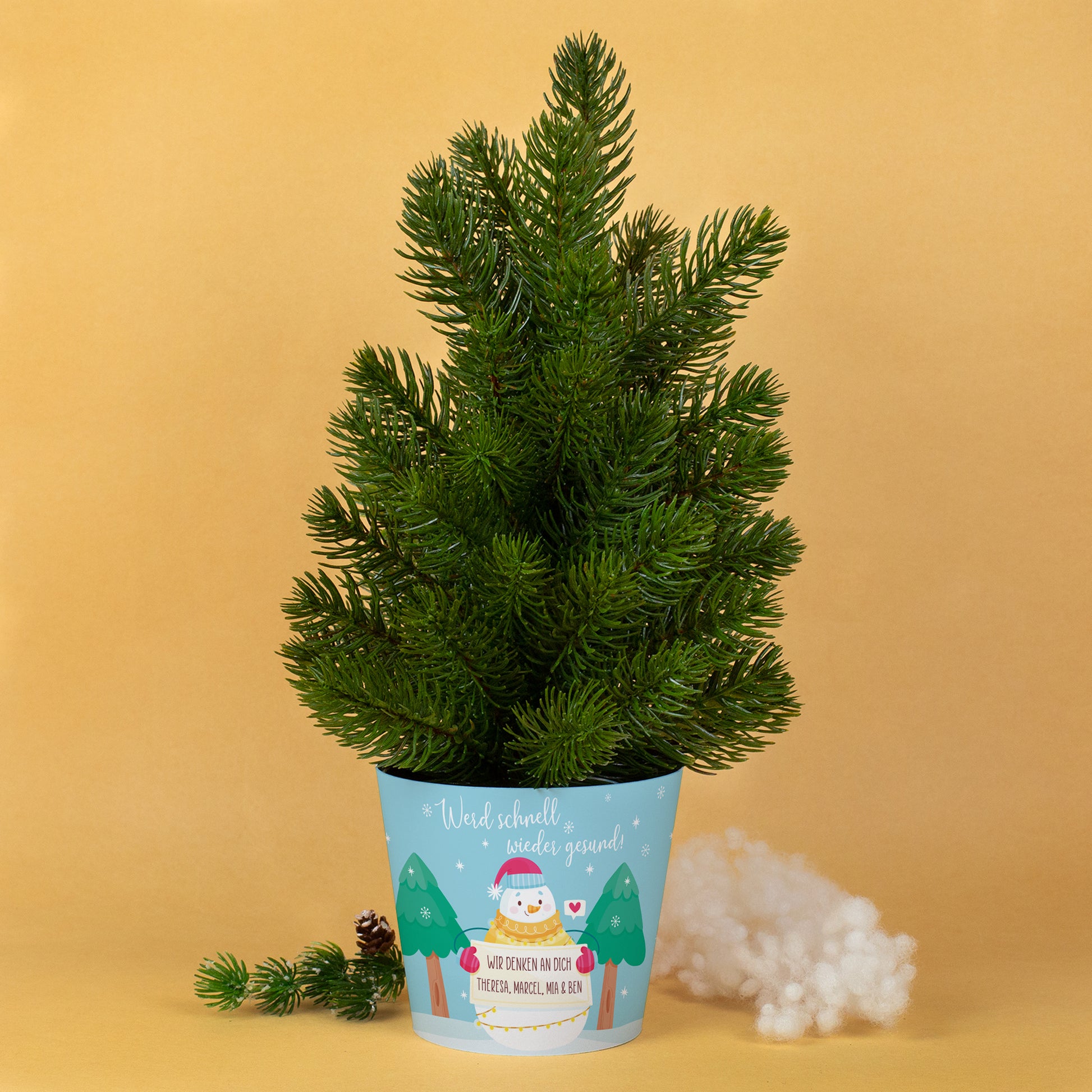 Künstlicher Mini-Weihnachtsbaum mit Schneemann-Motiv und Genesungsbotschaft „Werd schnell wieder gesund!“
