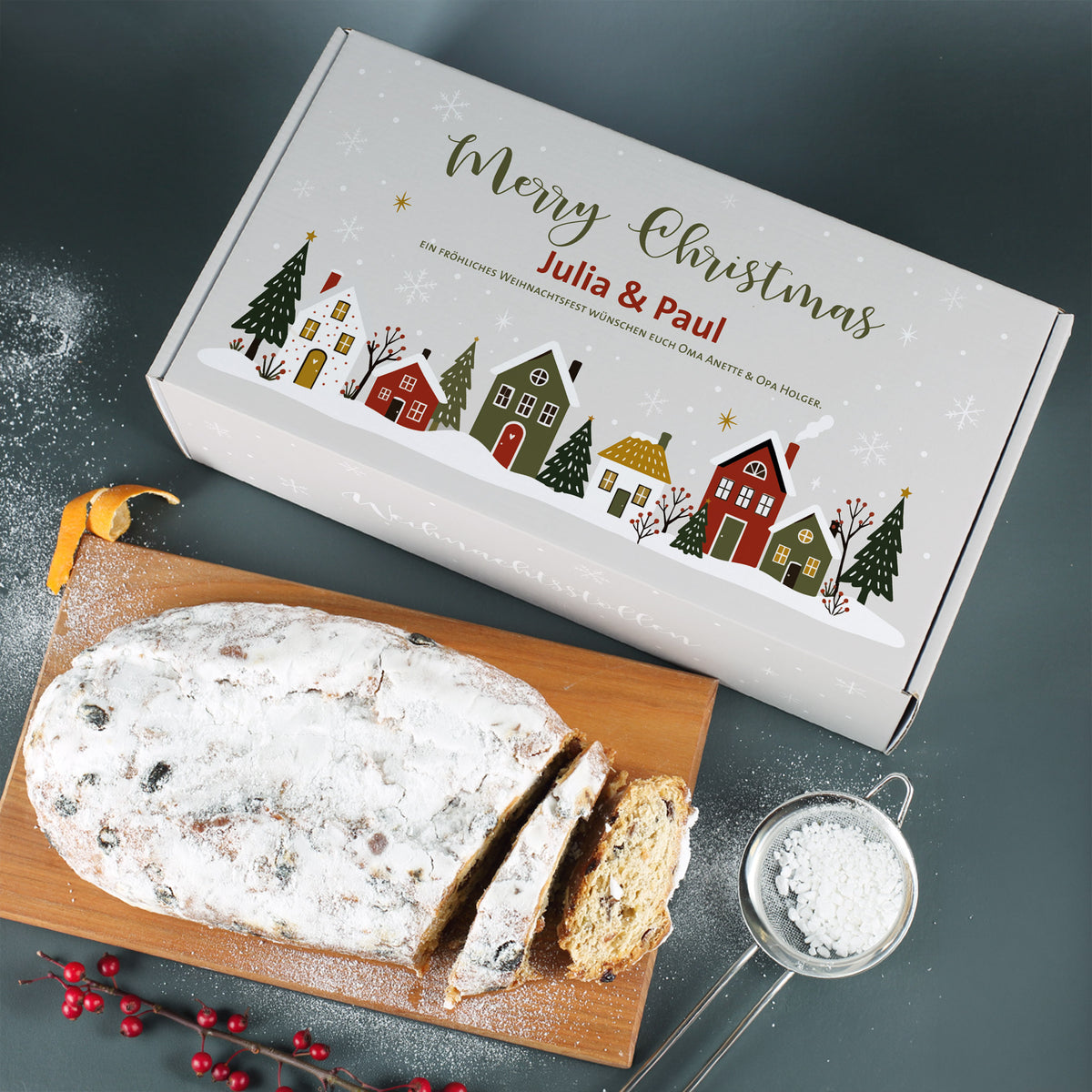 Personalisierte Stollen Geschenkbox mit Merry Christmas Motiv, Namen Julia und Paul sowie angeschnittenem Weihnachtsstollen