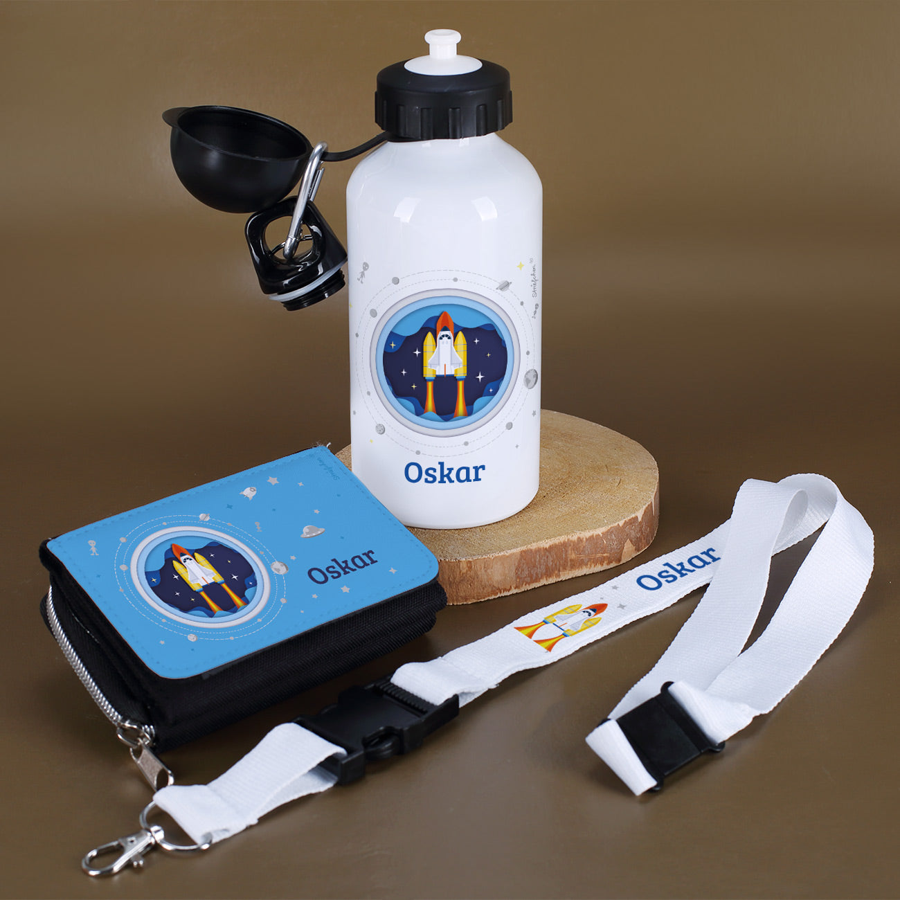 Trinkflasche, Geldbörse, Schlüsselband zur Einschulung mit Raumschiff-Motiv und Name