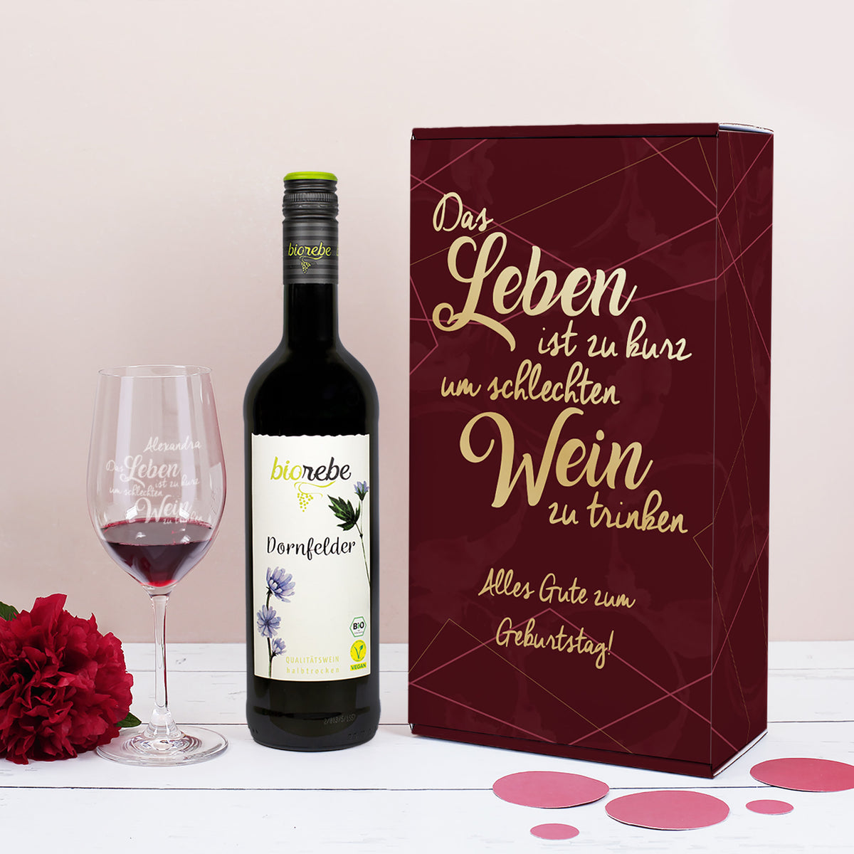 Biorebe Wein und Weinglas in personalisierter Geschenkverpackung