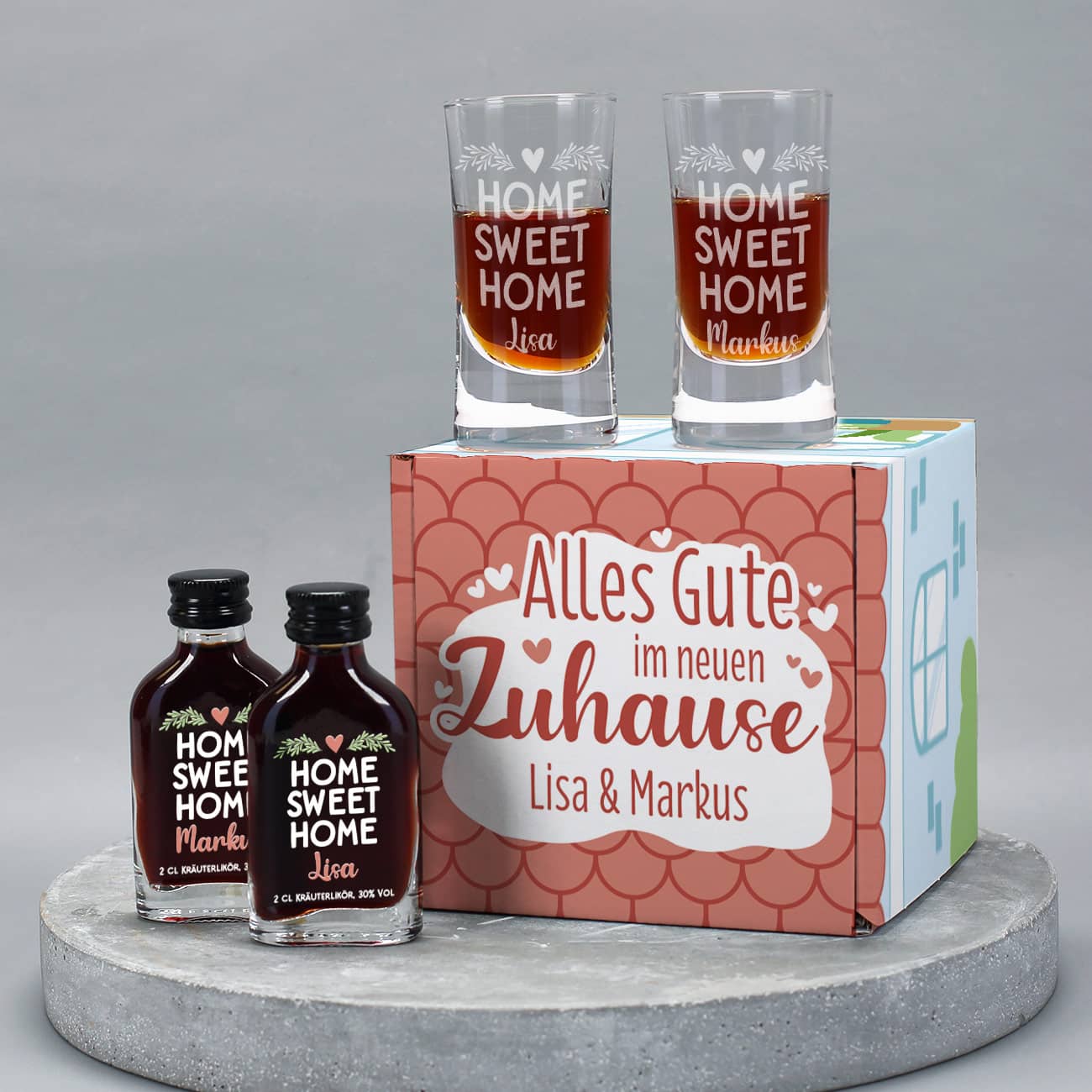 Kleines Geschenkset mit Schnapsgläsern, Kräuterlikör und Präsentverpackung als kleines Haus