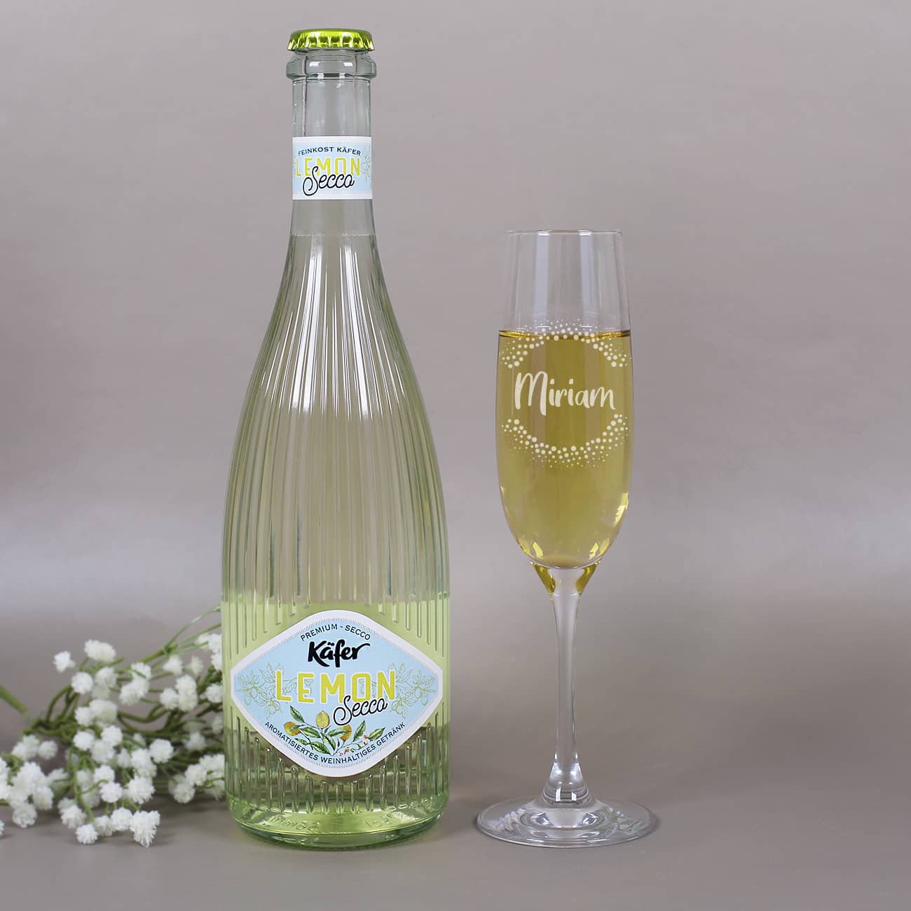 Lemon Secco von Käfer und Sektglas mit Namensgravur