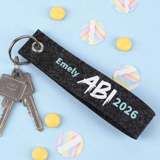 ABI - Schlüsselanhänger mit Name Emely - blauer Hintergrund