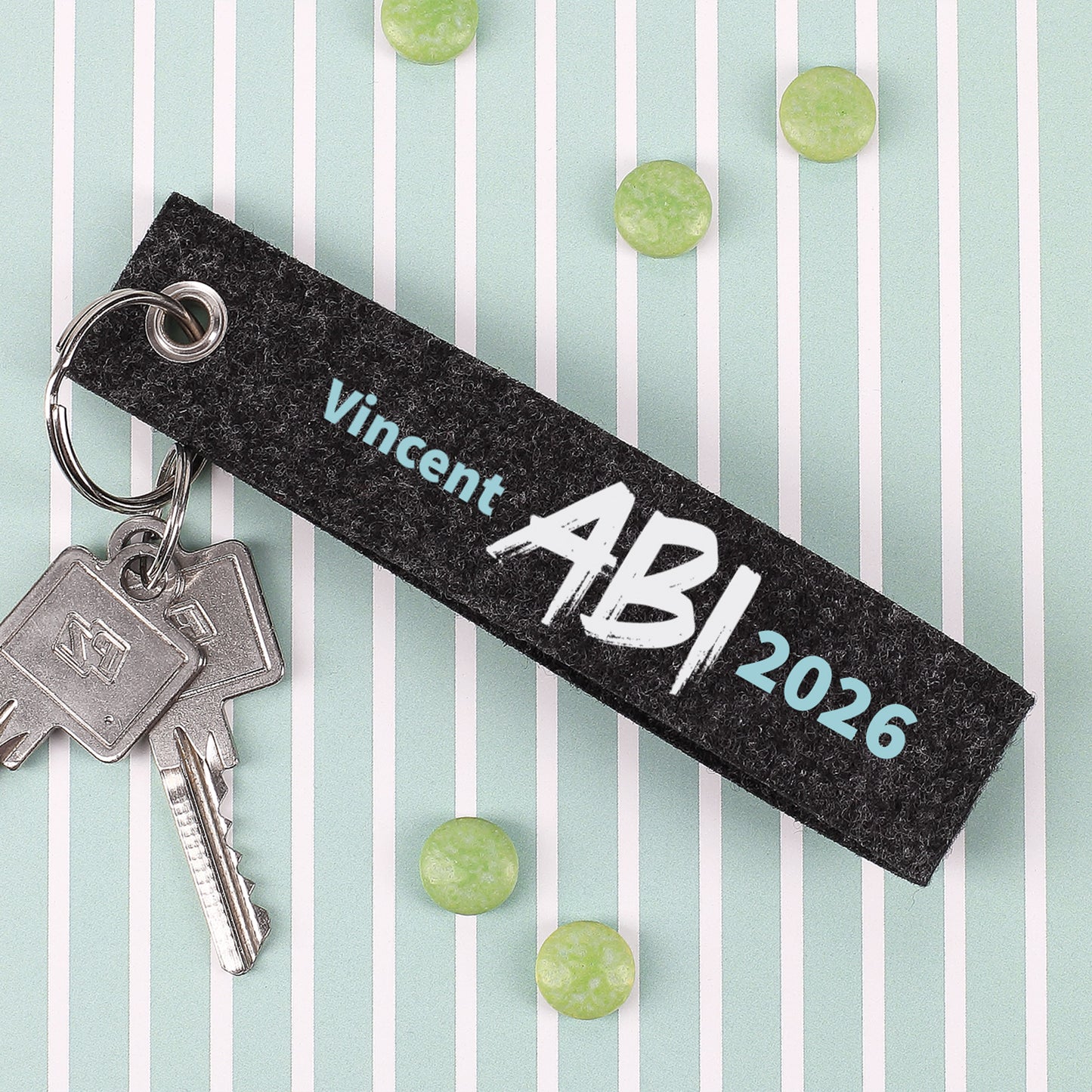 ABI - Schlüsselanhänger mit Name Vincent- gestreifter Hintergrund