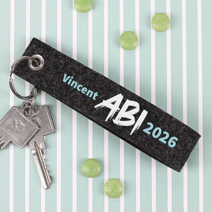 ABI - Schlüsselanhänger mit Name Vincent- gestreifter Hintergrund
