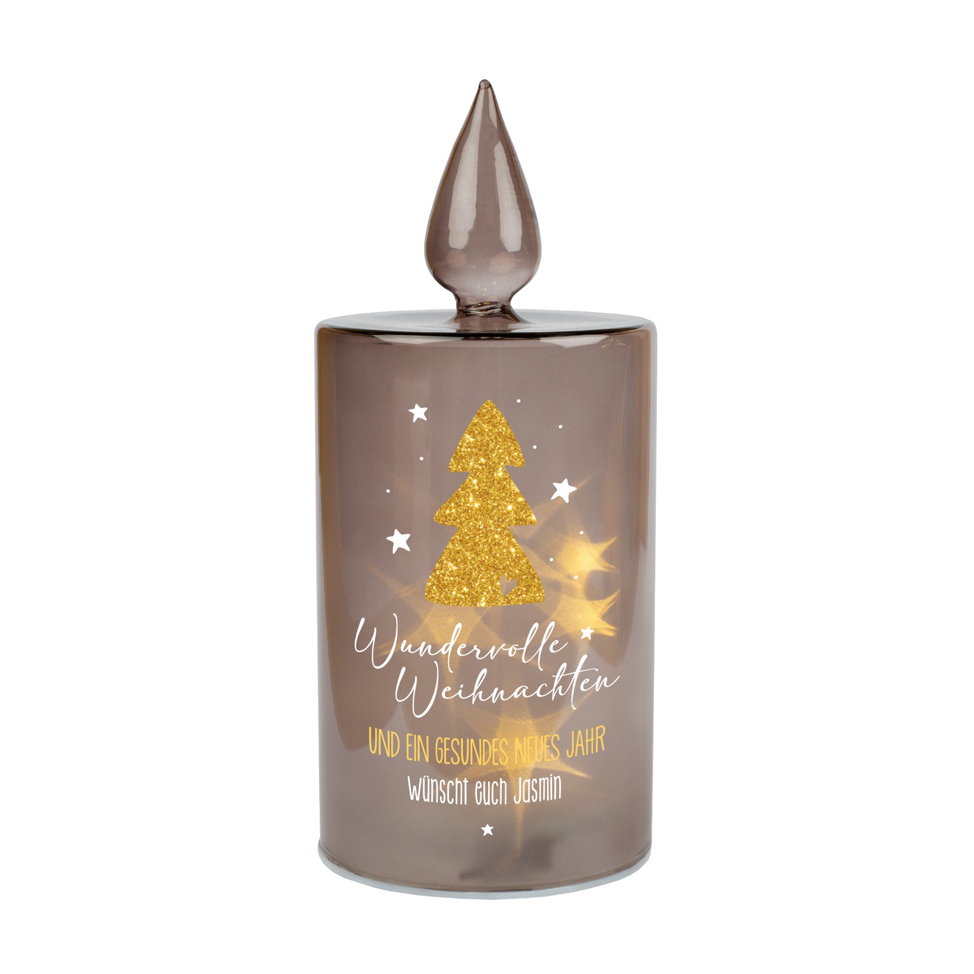 Freigestelltes LED-Glaslicht von Leonardo in Kerzenform mit Weihnachtsmotiv und Wunschtext.