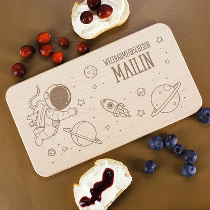 Mit persönlicher Gravur auf dem Brettchen