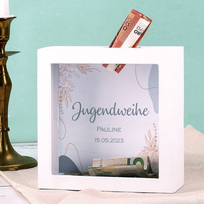 Personalisierte Bilderrahmenspardose mit weißen Rahmen und dem Schriftzug "Jugendweihe"