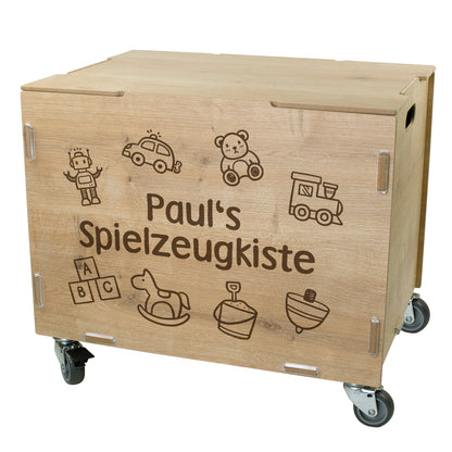 Personalisierte Spielzeugkiste aus Holz auf Rollen, Frontansicht mit Namen „Paul“ und umlaufenden Spielzeug-Illustrationen, Kiste geschlossen