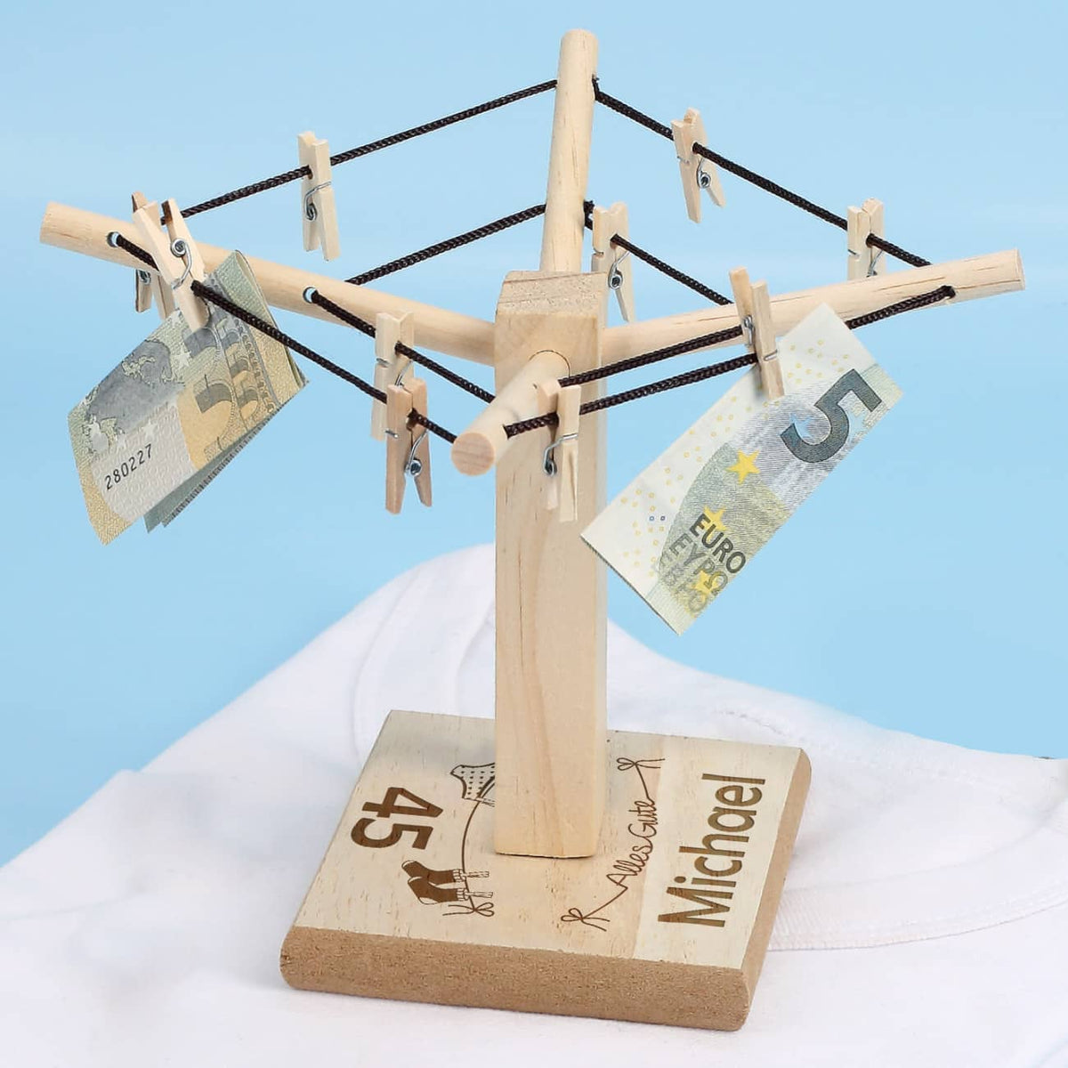 Gravierte Wäschespinne als Geschenk zum Geburtstag