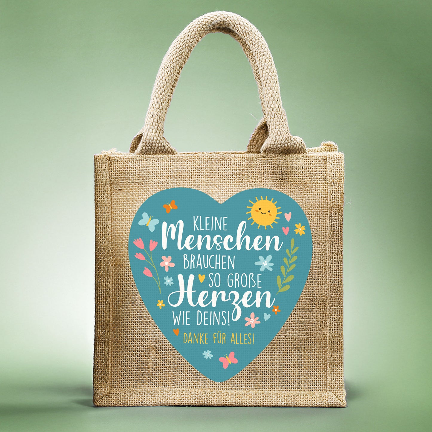 Jute-Geschenktüte als Dankeschön für Erzieher mit Wunschtext und Herz-Motiv