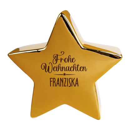 Freigestellter goldener Keramikstern mit „Frohe Weihnachten“ und personalisiertem Namen