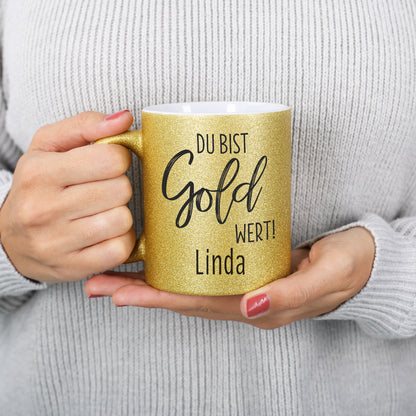 goldene Glitzertasse mit dem Namen bedruckt