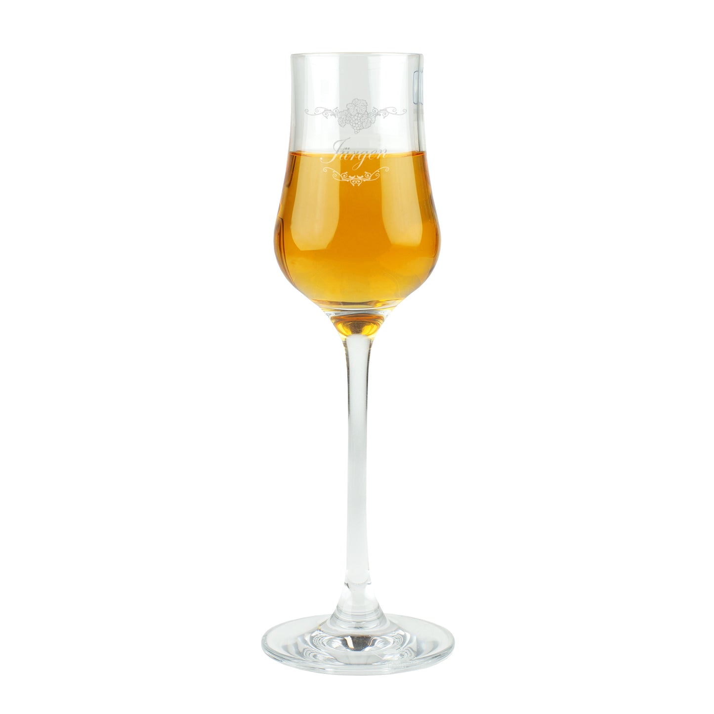 Freigestellte Aufnahme des Leonardo Grappaglases mit Gravur „Jürgen“ und goldenem Grappa.