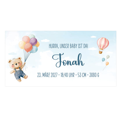 Personalisiertes Banner zur Geburt eines Jungen mit Teddy, Luftballons, Heißluftballon, Name Jonah und Geburtsdaten auf hellblauem Hintergrund