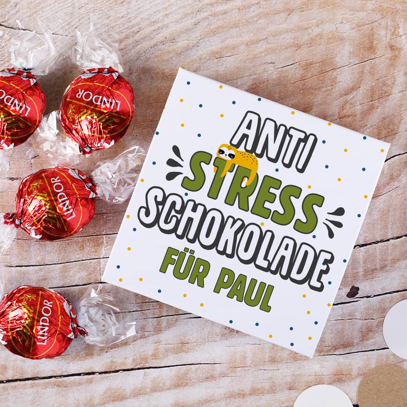 Kleine Geschenkverpackung mit Lindor Kugeln gegen Stress