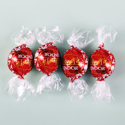 Eine Kleinigkeit zum Osterfest - Faltschachtel mit 4 Lindorkugeln