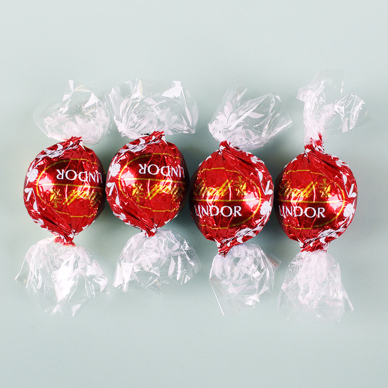 Süße Kleinigkeit zu Ostern - Faltschachtel mit 4 Lindorkugeln