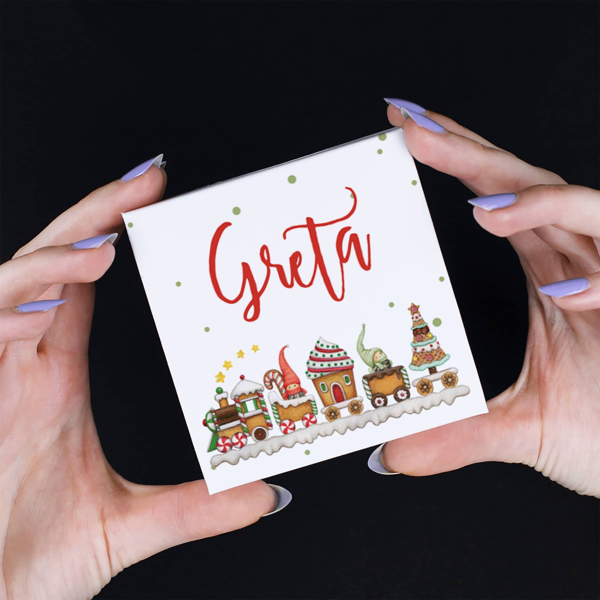 Kleines Geschenk für Kinder Wichtel Weihnachtszug Motiv mit Name auf einer Verpackung mit Lindor Kugeln