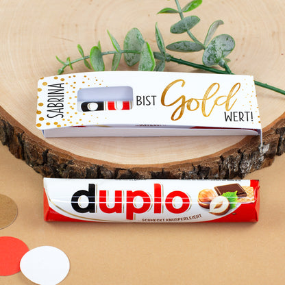 duplo Geschenk mit individueller Verpackung auf Holzscheibe mit Dekoration