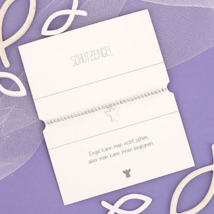 Schutzengel Armband zur Konfirmation auf lila Hintergrund