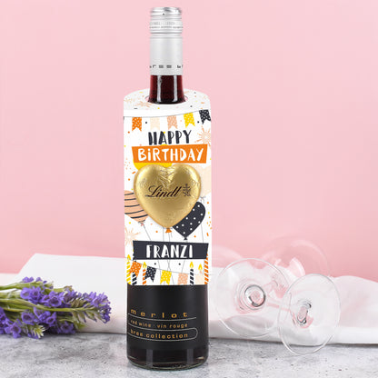 Goldenes Lindt Schokoladenherz auf dem Geburtstagsanhänger – glänzend und mittig angebracht.