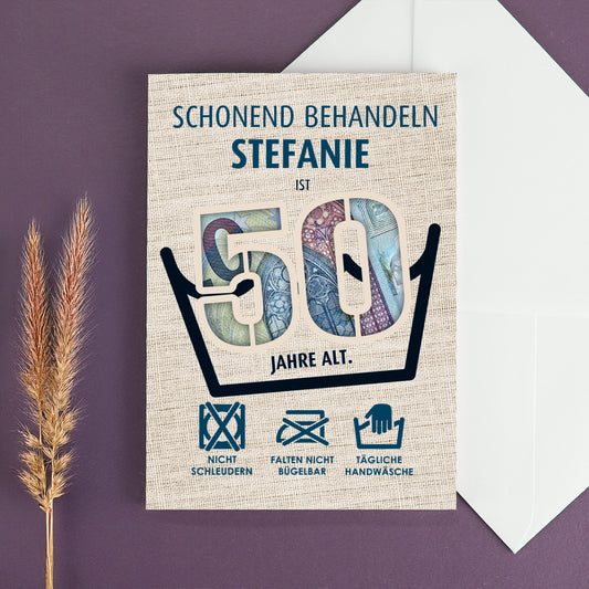 Geburtstagskarte "Schonend behandeln" mit Geldschein hinter Zahl 50 und Namen "Stefanie"
