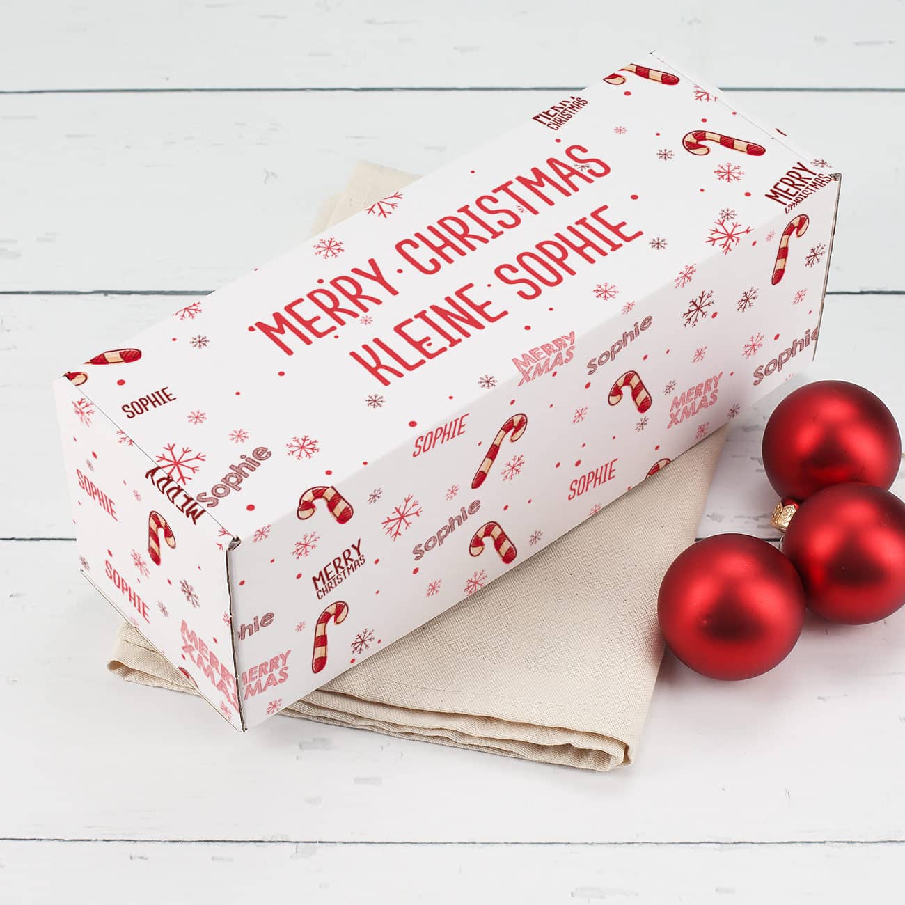 Pappbox zu Weihnachten mit Zuckerstangen-Motiv, Wunschname und Wunschtext