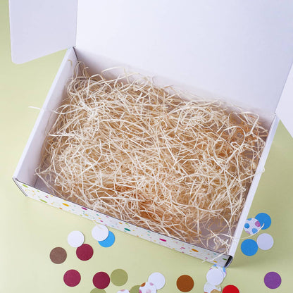 Geschenkbox Osternest gefüllt mit Holzwolle