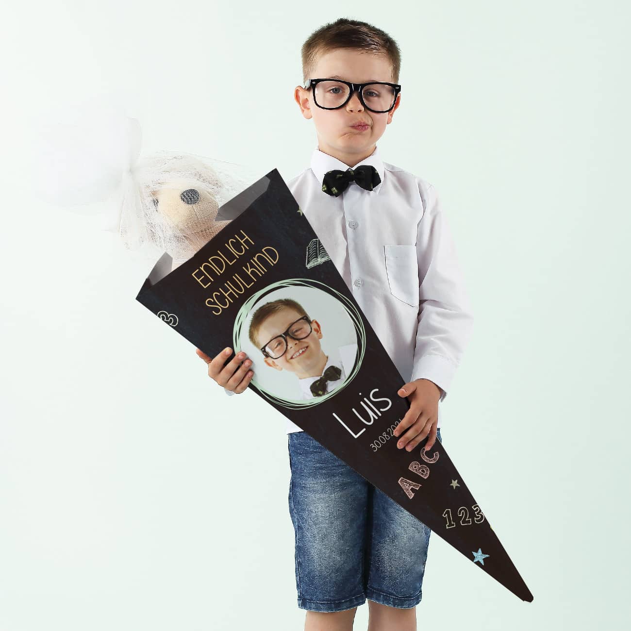 Schultüte mit Foto, Name und Datum zur Schuleinführung